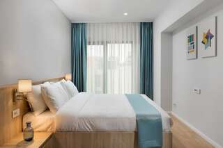 Отель Athina Suites Hotel Бухарест Двухместный номер с 1 кроватью и балконом-4